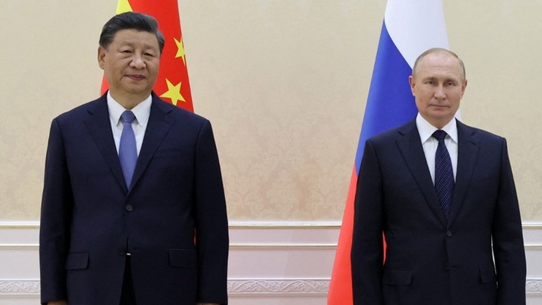 Presiden China, Xi Jinping dan Presiden Rusia, Vladimir Putin/ AFP