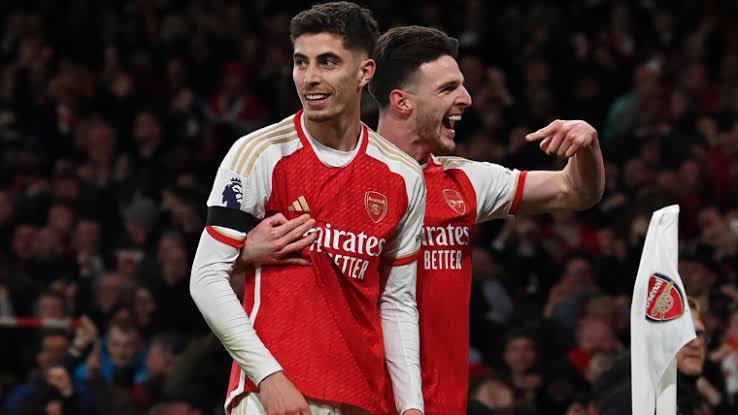 Pemain Arsenal merayakan gol (SinPo.id/Sporting News)