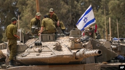 Tentara Israel di tank dekat perbatasan Israel-Gaza, Israel selatan (SinPo.id/AP)