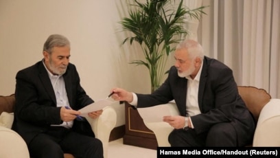 Pemimpin Hamas Ismail Haniyeh dan pemimpin Jihad Islam Ziyad Al Nakhalal (SinPo.id/Reuters)