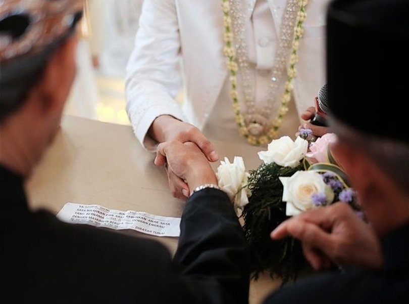Ilustrasi nikah di KUA. (SinPo.id/Getty Images)