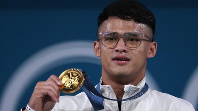 Rizki Juniansyah merebut emas Olimpiade Paris 2024. (SinPo.id/REUTERS/Amanda Perobelli)