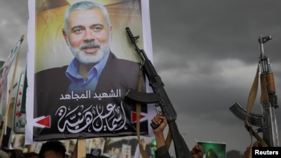 Poster pemimpin Hamas yang dibunuh, Ismail Haniyeh (SinPo.id/Reuters)