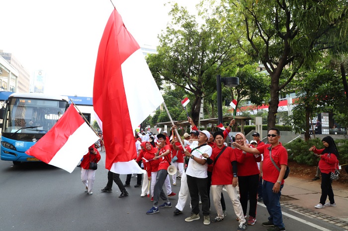 Antusiasme warga menghadiri acara Kirab Bendera Merah Putih dan teks proklamasi (SinPo.id/ Ashar)