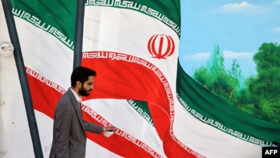 mural bendera Iran (SinPo.id/AFP)