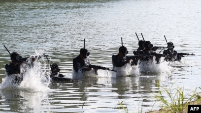 Sejumlah tentara Korea Utara ambil bagian dalam latihan di pusat pasukan operasi khusus di lokasi yang tidak disebutkan di Korea Utara (SinPo.id/AFP)id/