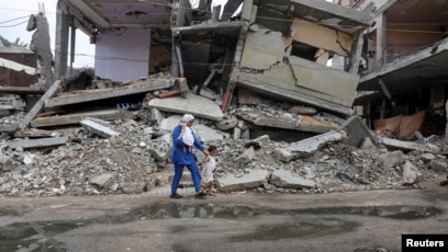 reruntuhan rumah yang hancur akibat serangan Israel (SinPo.id/Reuters)