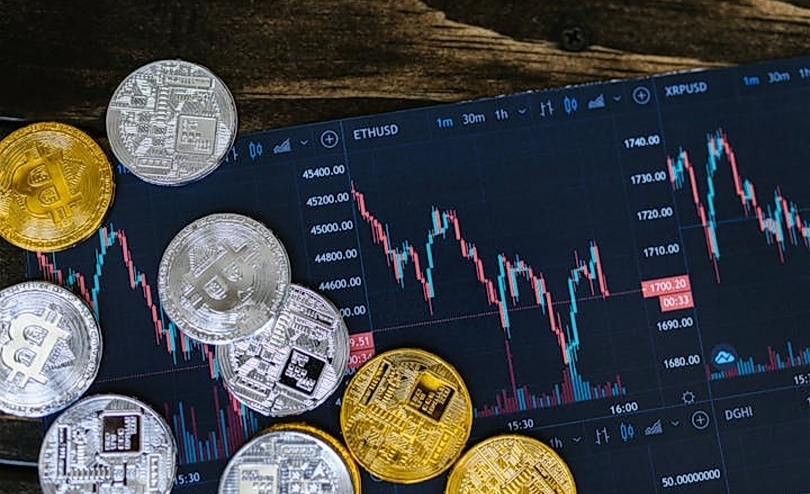 Ilustrasi koin di saham. (SinPo.id/Pixabay)