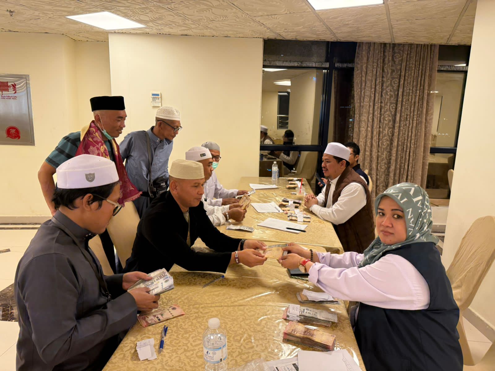 Penyaluran kompensasi ke jemaah haji (SinPo.id/ Dok. BPKH Limited)