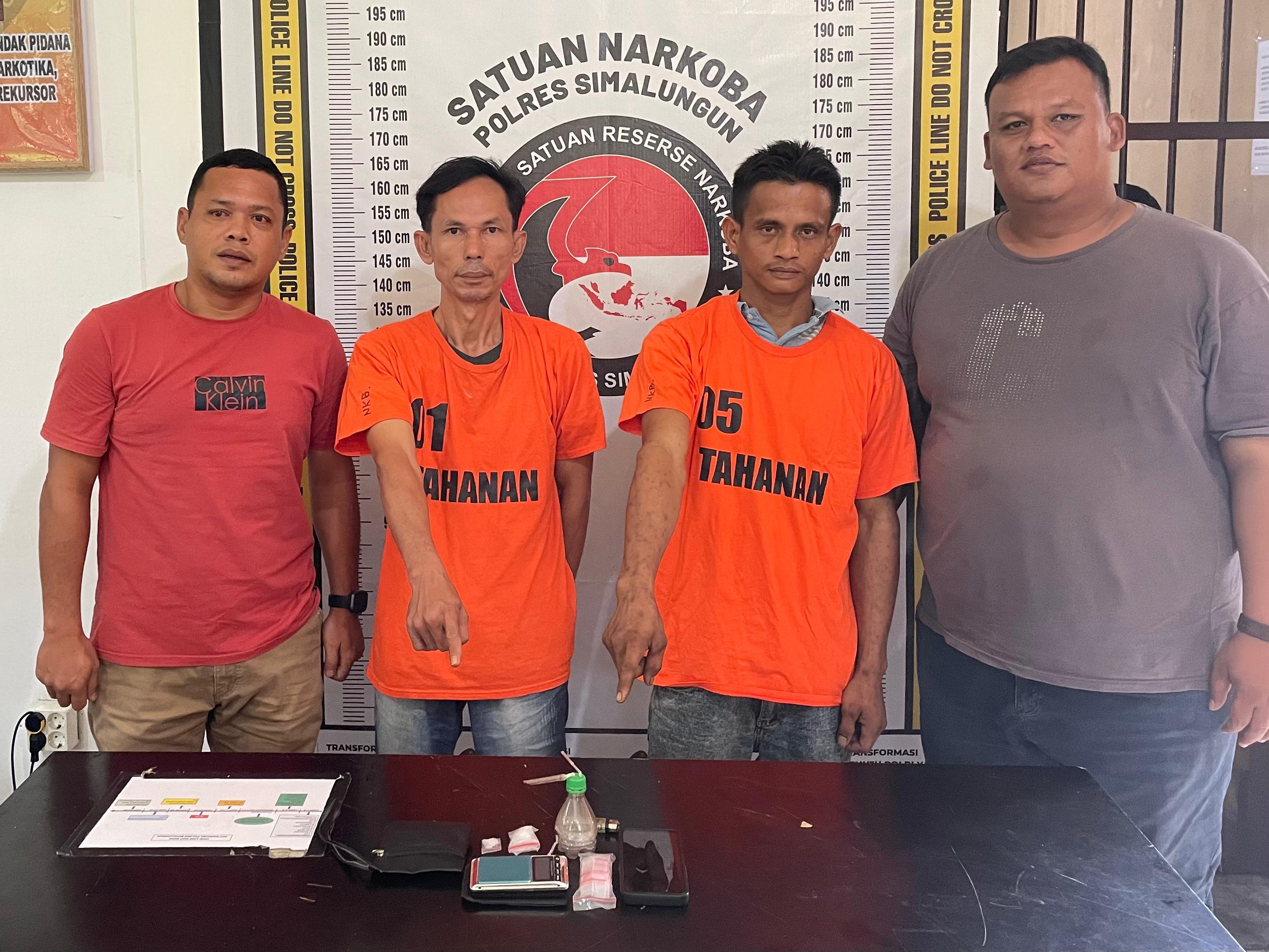 Dua pengedar sabu yang ditangkap Polres Simalungun (SinPo.id/ Humas Polri)