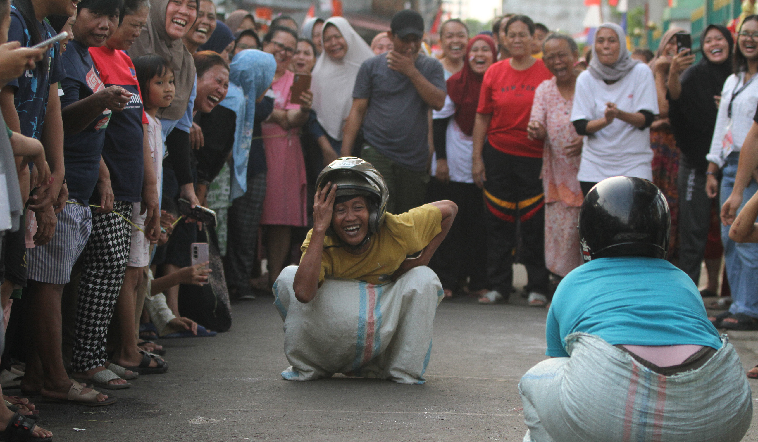 Lomba HUT ke-80 RI di Menteng Jaya. (Agus Priatna/SinPo.id)