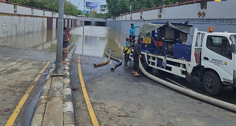 Ilustrasi ruas jalan di Denpasar tergenang akibat banjir. (SinPo.id/dok. KemenPU)