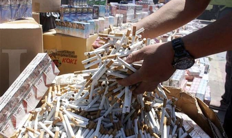 Ilustrasi pemusnahan rokok ilegal. (SinPo.id/Ashar)