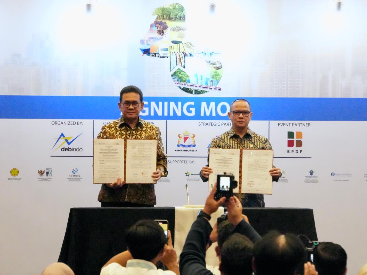 Menteri P2MI Mukhtarudin dan Mendag Budi Santoso melakukan MoU (SinPo.id/ Dok. KP2MI)