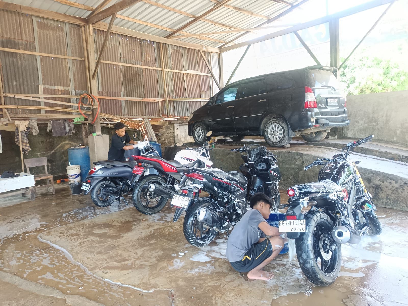 Polri Buka Layanan Servis dan Cuci Motor Gratis untuk Warga Sumut (SinPo.id/tim media)