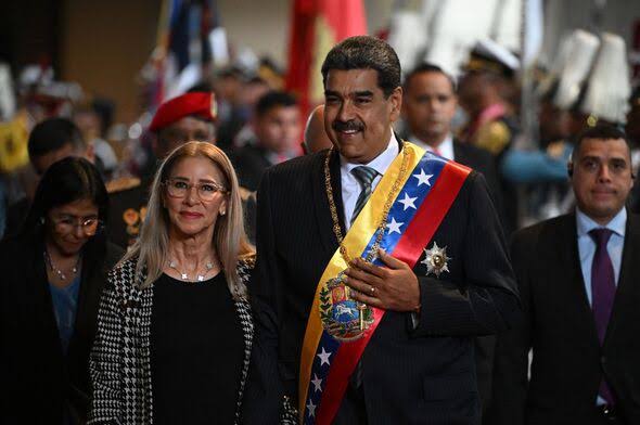 Preziden Venezuela Nicolas Maduro bersama istrinya (SinPo.id/AFP)