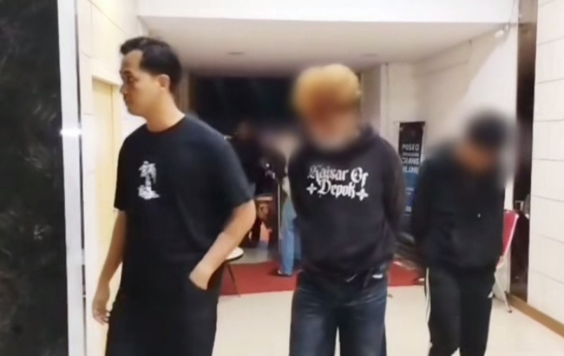 Pelaku pembacokan saat ditangkap (SinPo.id/Resmob PMJ)