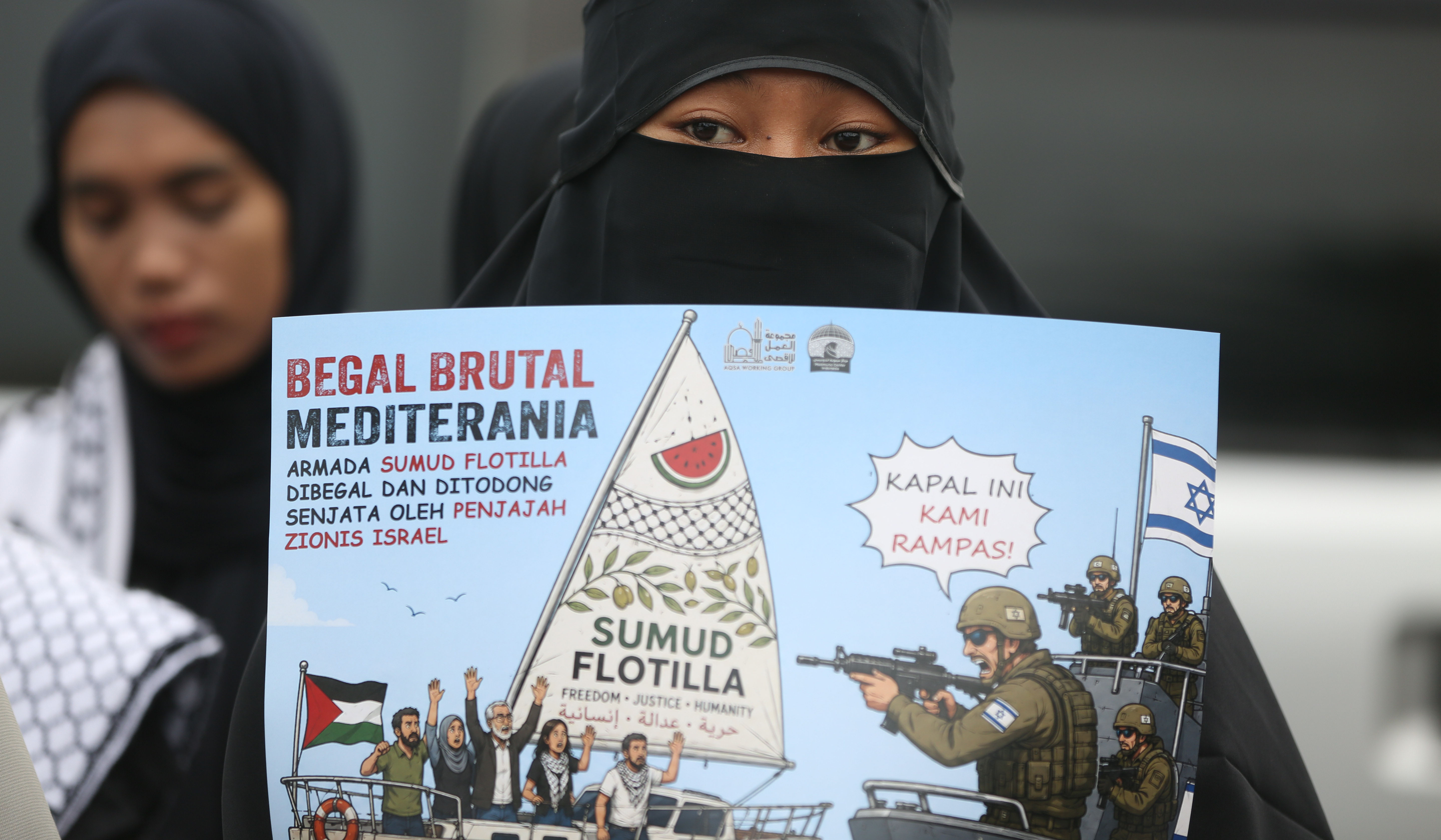 Aksi kecam kekerasan Israel terhadap aktivis dan jurnalis. (Agus Priatna/SinPo.id)