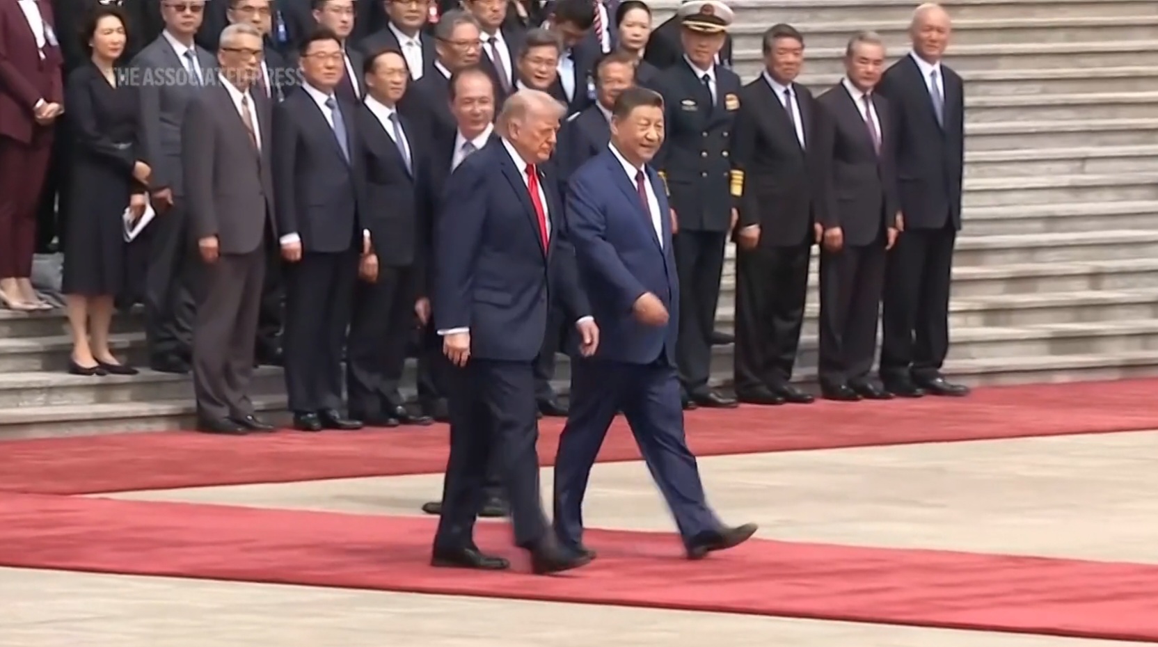 Presiden China Xi Jinping menyambut kedatangan Presiden AS Donald Trump (SinPo.id/AFP)