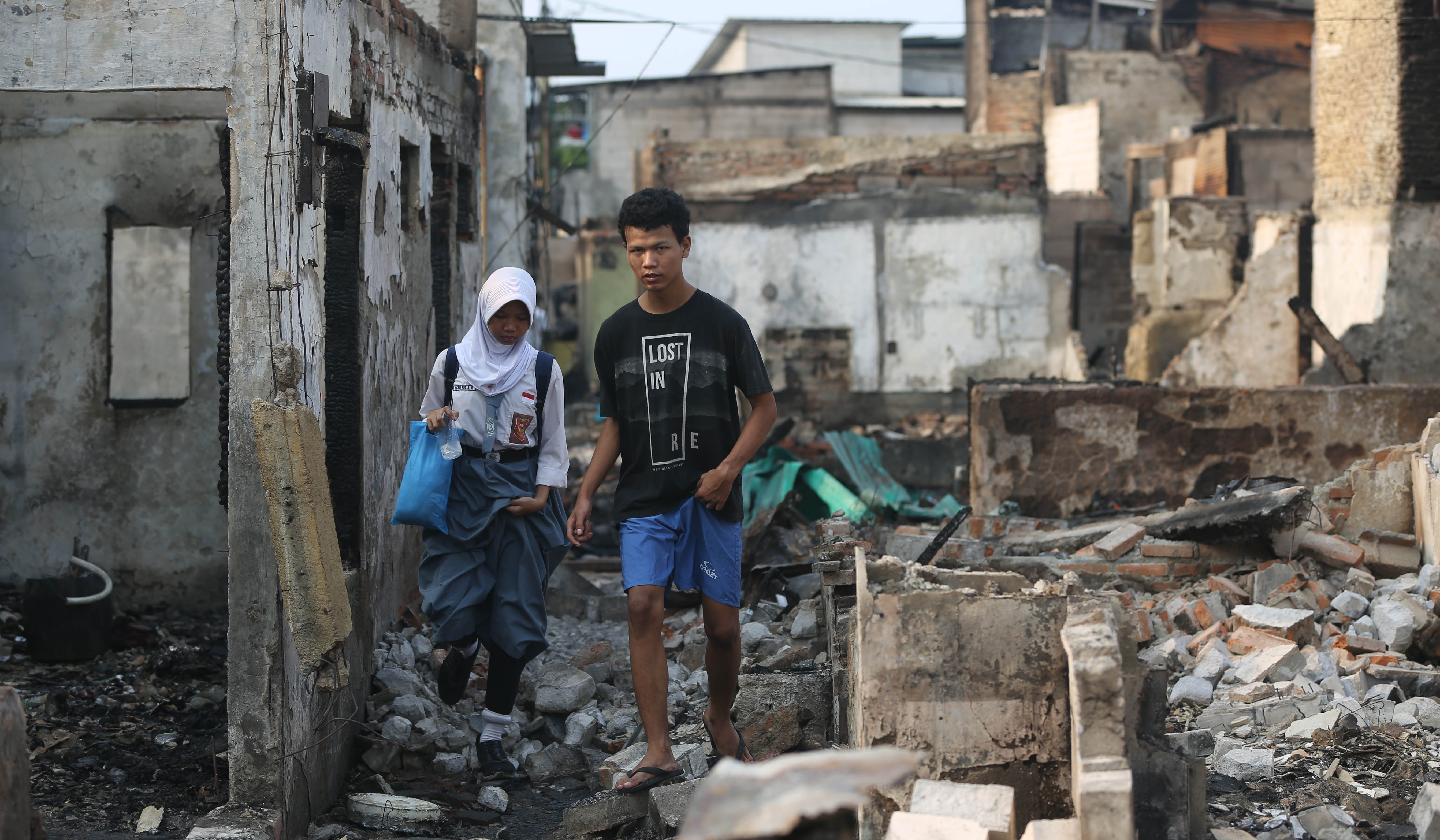 Sisa kebakaran yang hanguskan 250 rumah di Kamayoran. (Agus Priatna/SinPo.id)