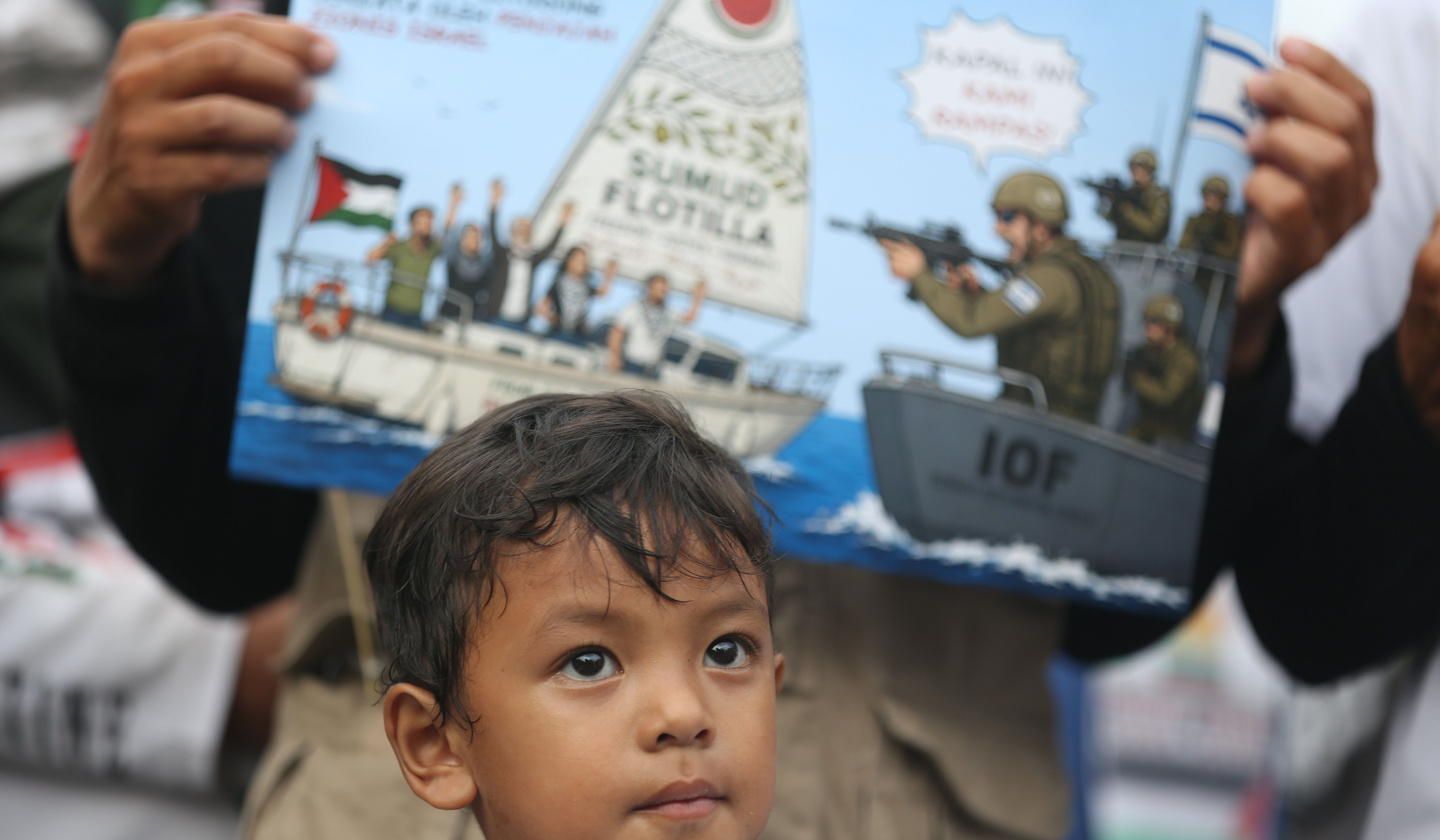 Aksi kecam kekerasan Israel terhadap aktivis dan jurnalis. (Agus Priatna/SinPo.id)