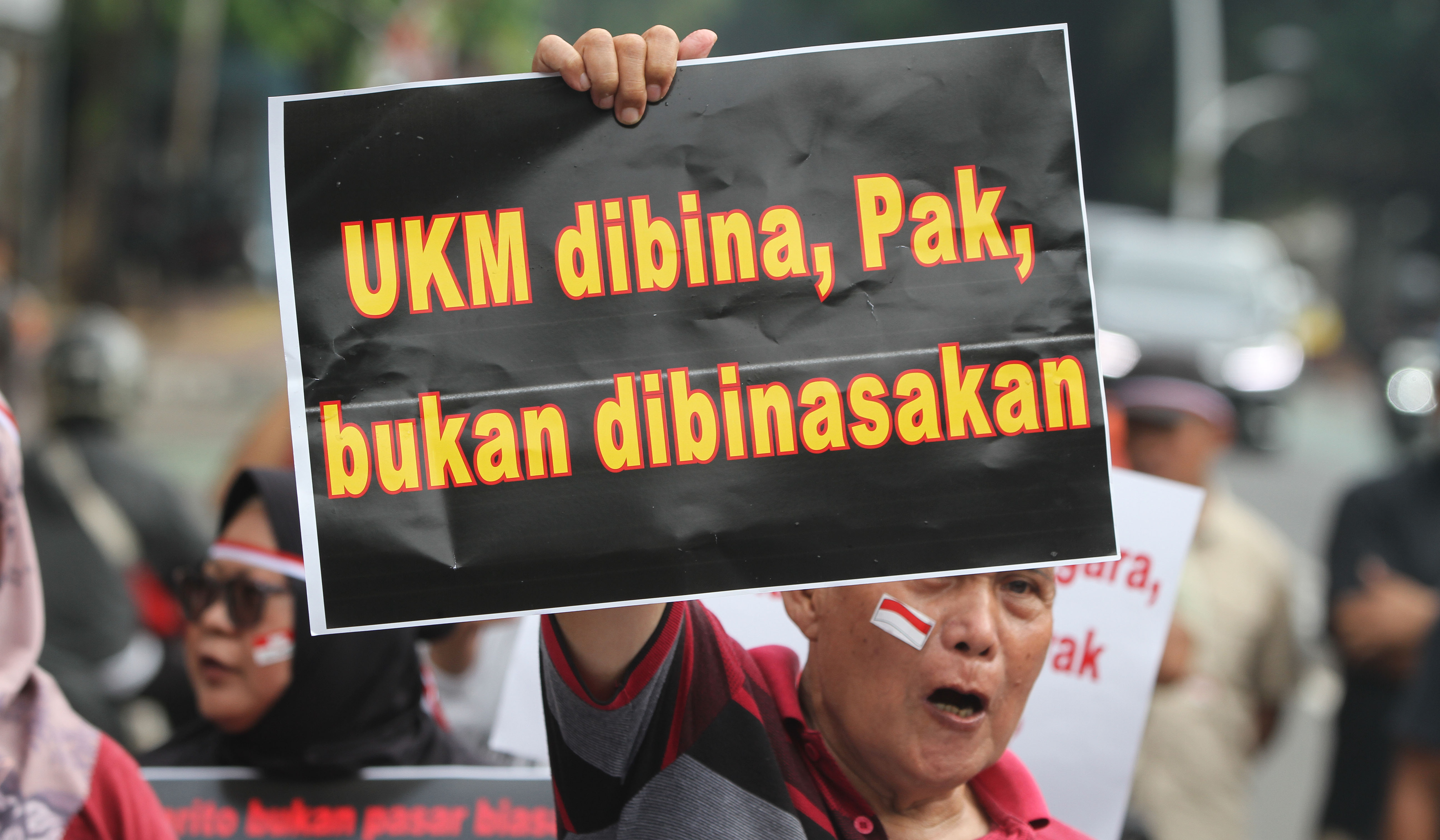 Aksi pedagang Pasar Hewan Barito. (Agus Priatna/SinPo.id)