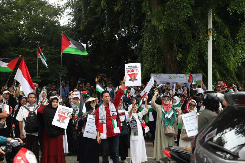 Aliansi Pemuda Indonesia Untuk Palestina gelar aksi damai demo merayakan kemenangan gaza atas genjatan senjata permanen yang berlaku dari 19 Januari (Ashar/SinPo.id)