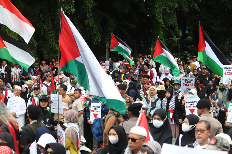 Aliansi Pemuda Indonesia Untuk Palestina gelar aksi damai demo merayakan kemenangan gaza atas genjatan senjata permanen yang berlaku dari 19 Januari (Ashar/SinPo.id)