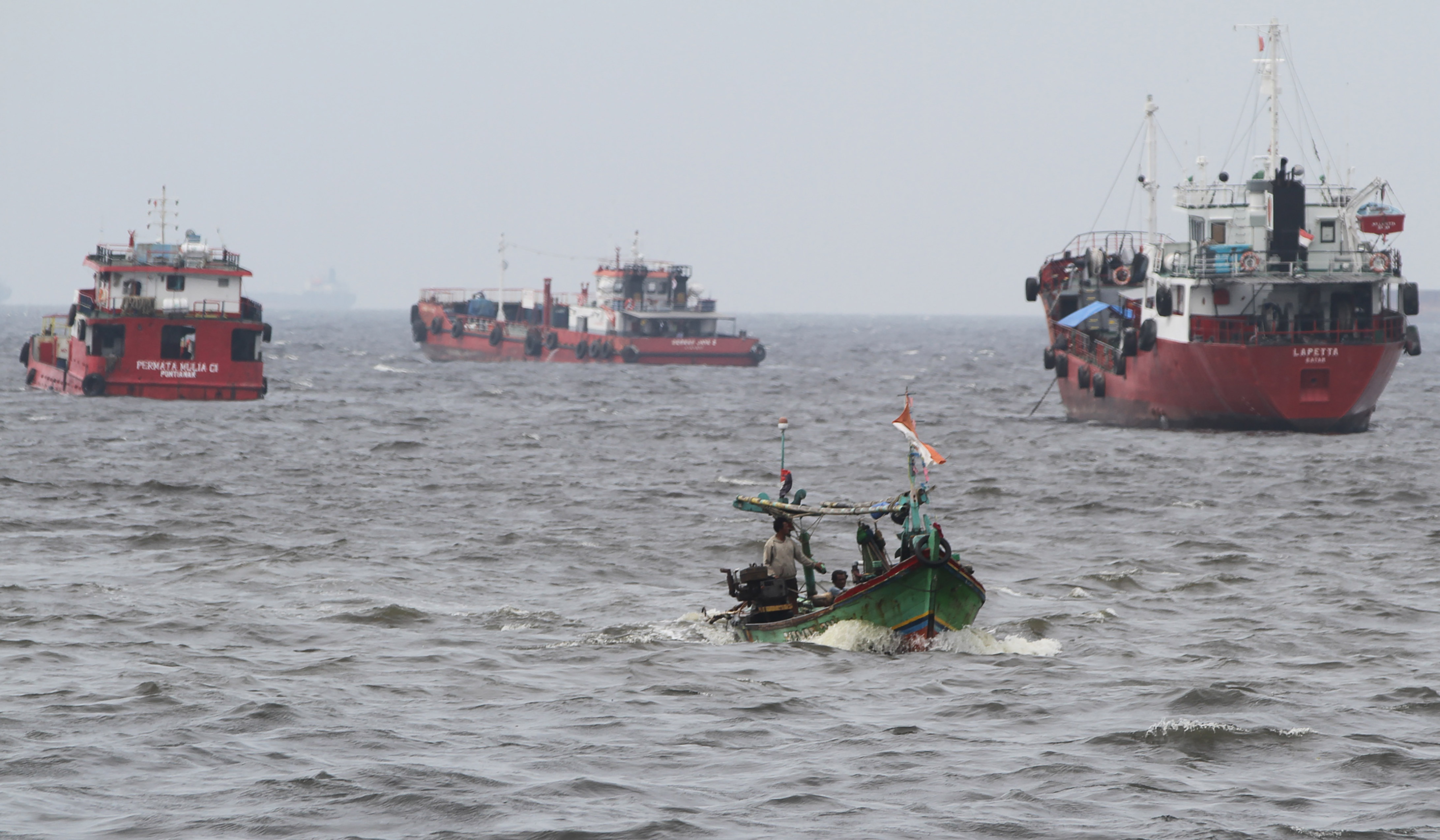 Tanggul laut dikawasan Kalibaru, Jakarta. (Agus Priatna/SinPo.id)