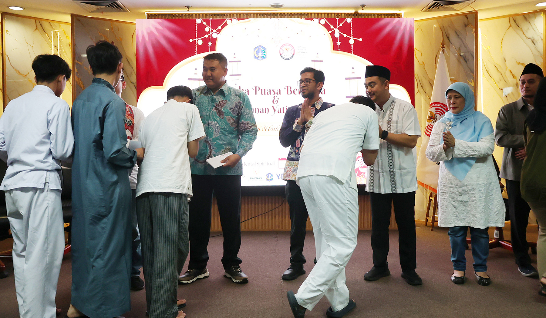 Sinpo TV & KPID Jakarta bagikan santunan anak yatim di Ramadan 1447 H. (Agus Priatna/SinPo.id)