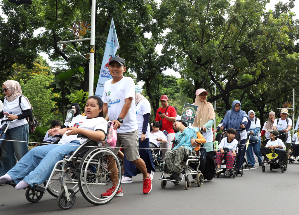 Dewan Nasional Indonesia Untuk Kesejahteraan Sosial (DNIKS) dalam peringati Hari Disabilitas Internasional menggelar Gerak Sehat 2025 (Ashar/SinPo.id)