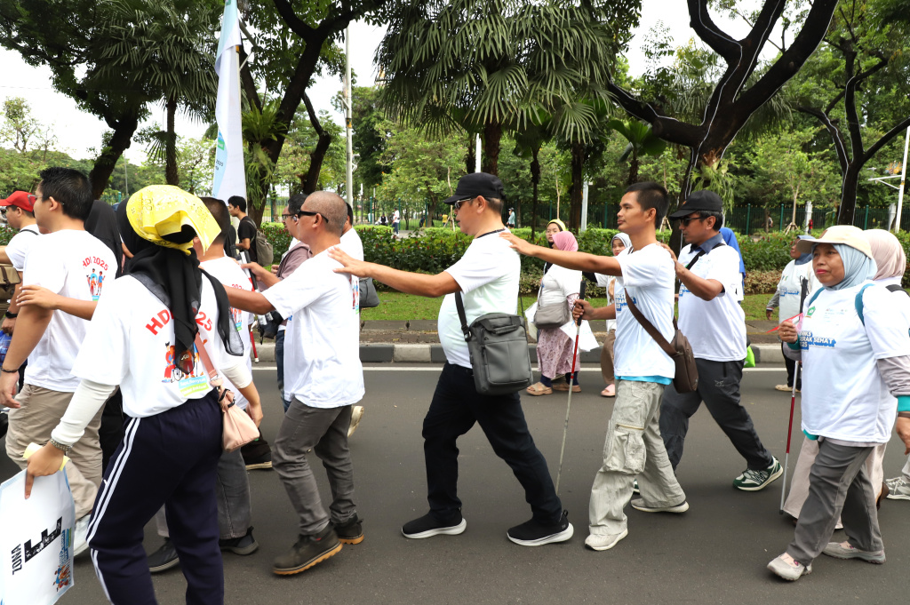 Dewan Nasional Indonesia Untuk Kesejahteraan Sosial (DNIKS) dalam peringati Hari Disabilitas Internasional menggelar Gerak Sehat 2025 (Ashar/SinPo.id)
