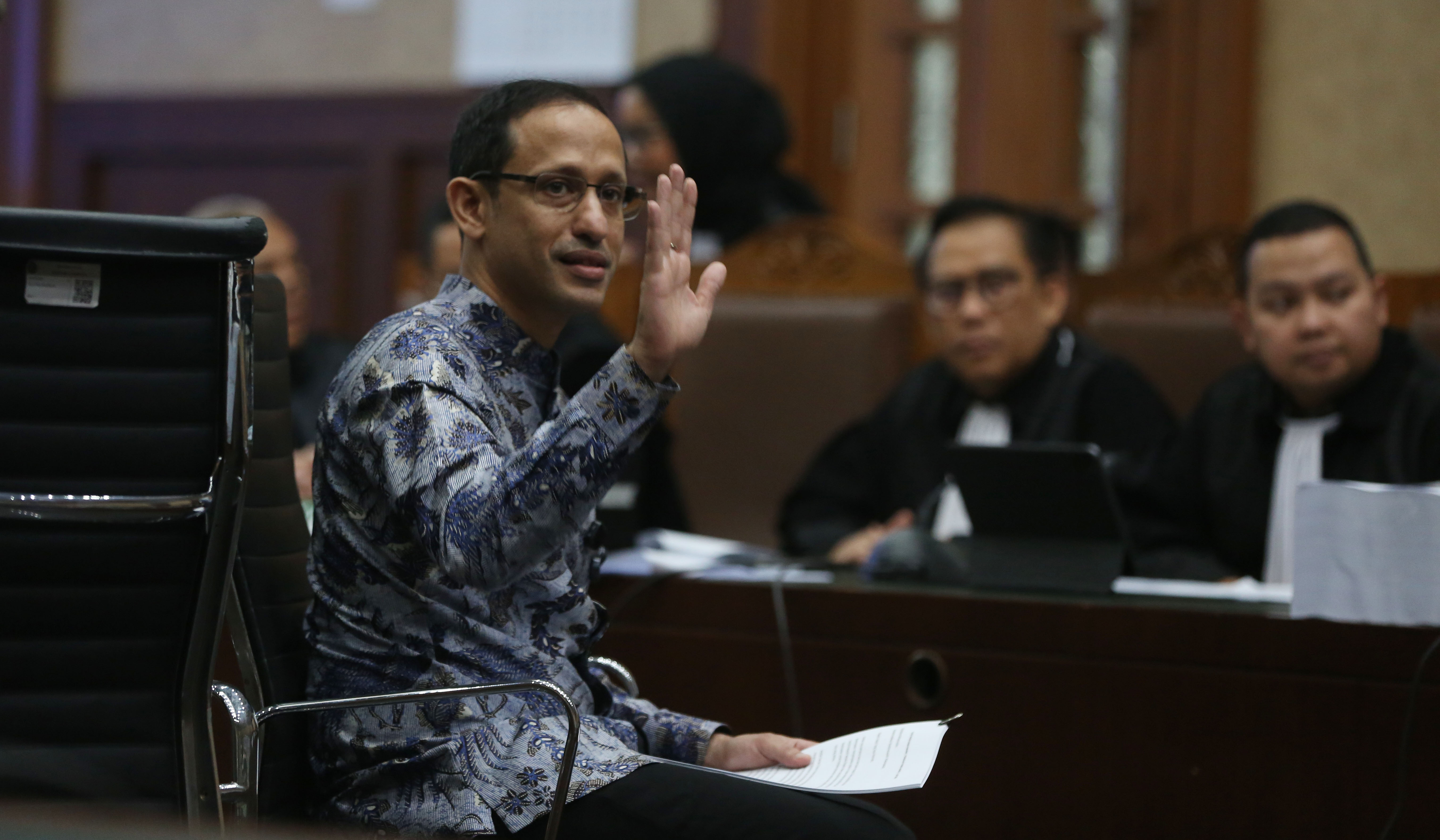 Nadiem saat menjalani sidang lanjutan dengan agenda pembacaan pledoi. (Agus Priatna/SinPo.id)