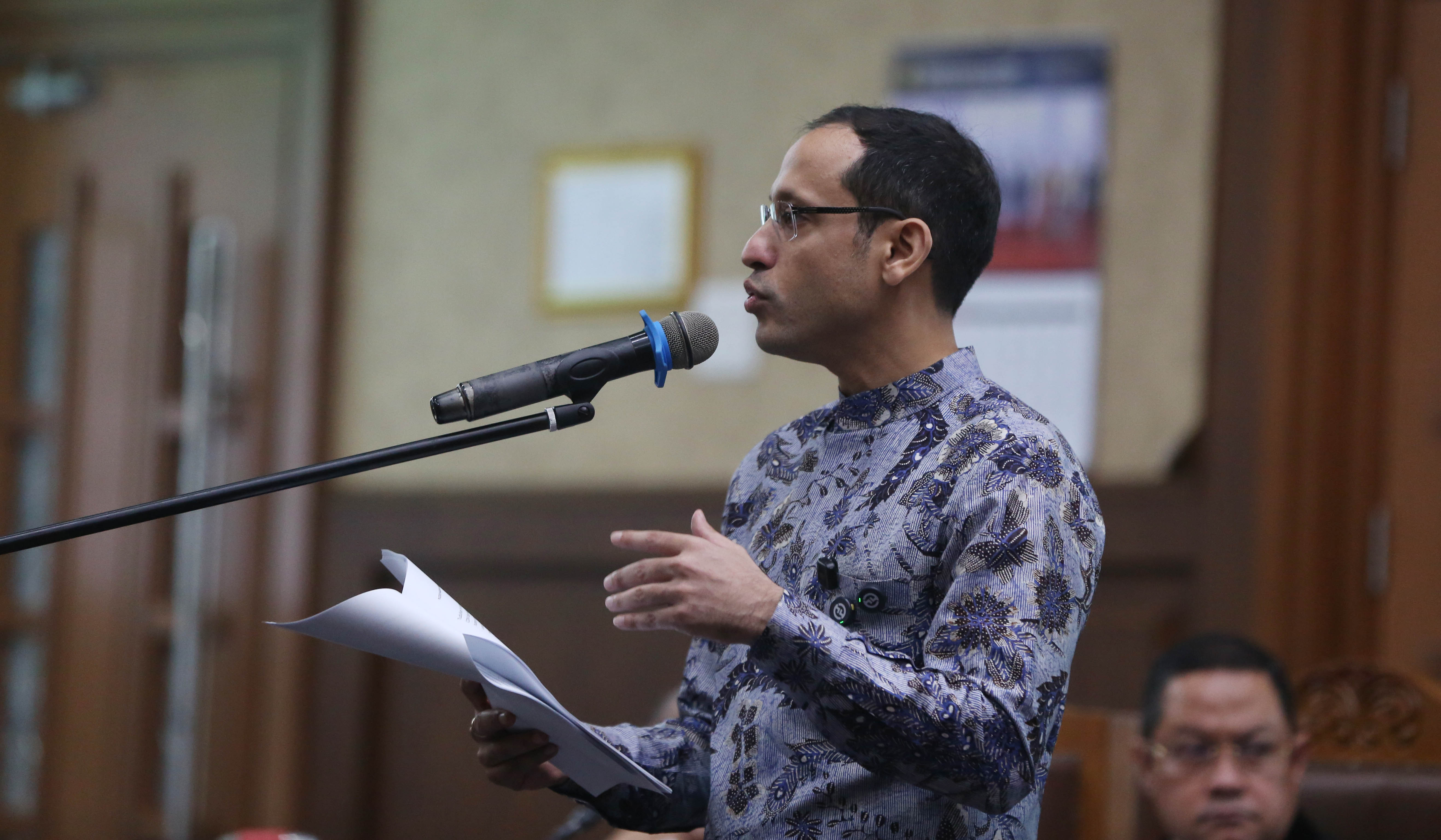 Nadiem saat menjalani sidang lanjutan dengan agenda pembacaan pledoi. (Agus Priatna/SinPo.id)