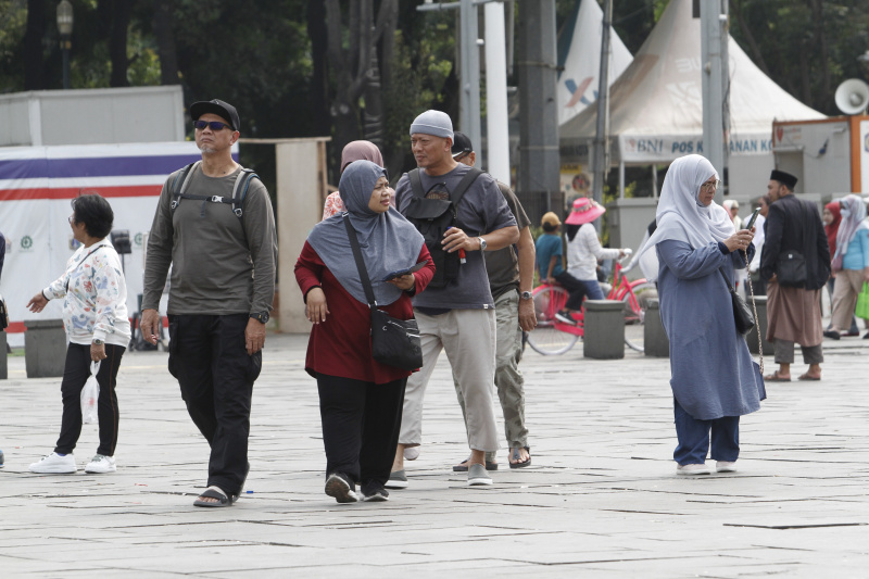 Wisatawan memadati tempat wisata Kota Tua Jakarta saat libur Natal dan Tahun Baru (Ashar/SinPo.id)