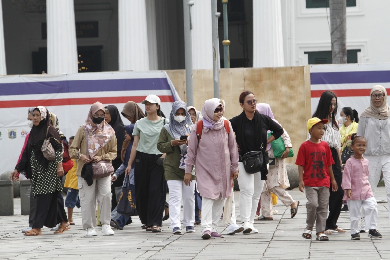 Wisatawan memadati tempat wisata Kota Tua Jakarta saat libur Natal dan Tahun Baru (Ashar/SinPo.id)