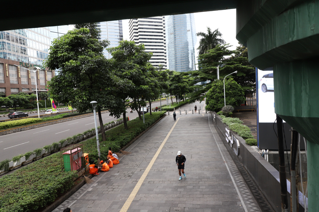 Suasana sangat lengang libur panjang tahun baru Imlek 2577 di kawasan Sudirman (Ashar/SinPo.id)