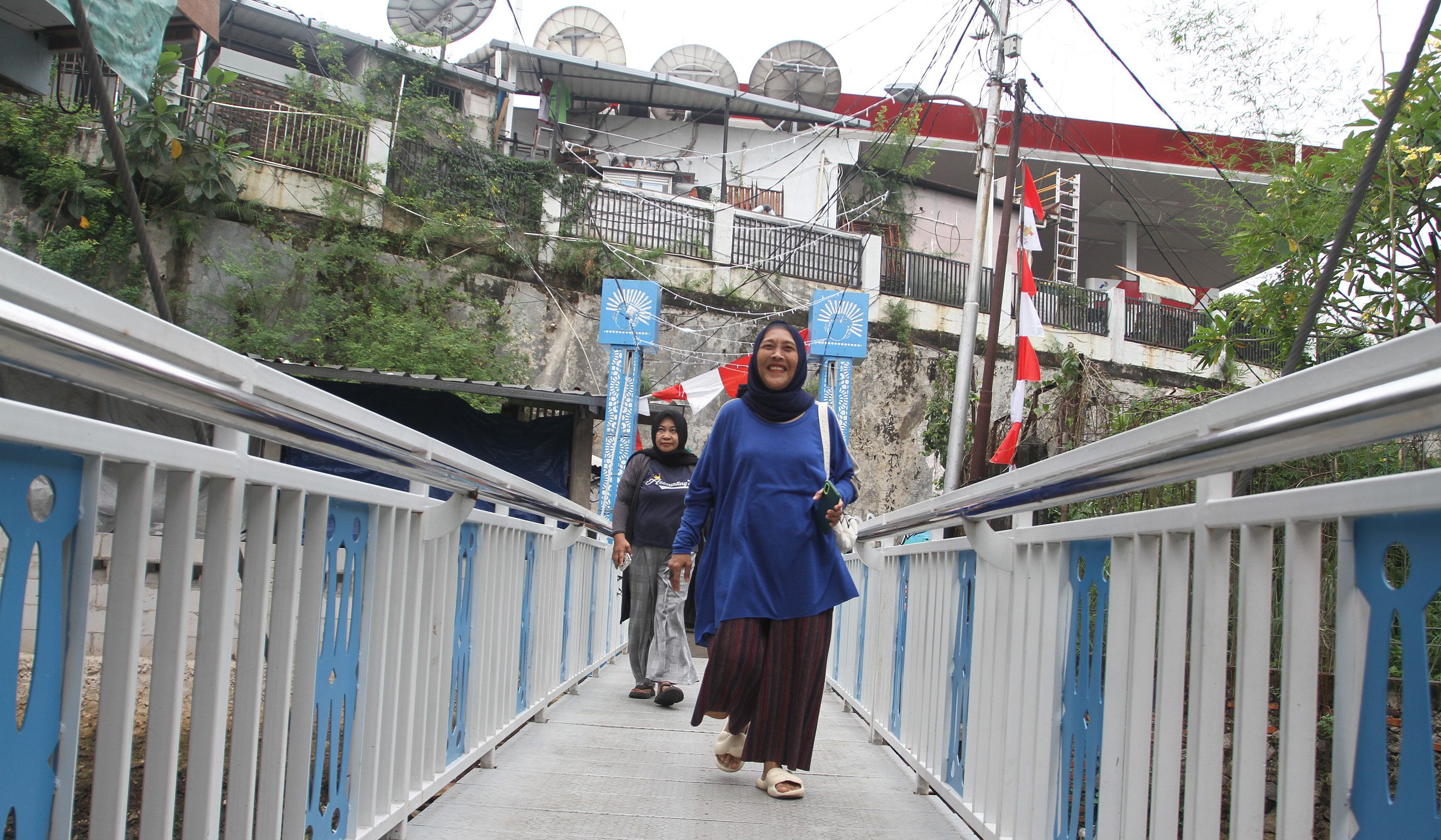 Jembatan Antar Kampung di Jakarta. (Agus Priatna/SinPo.id)
