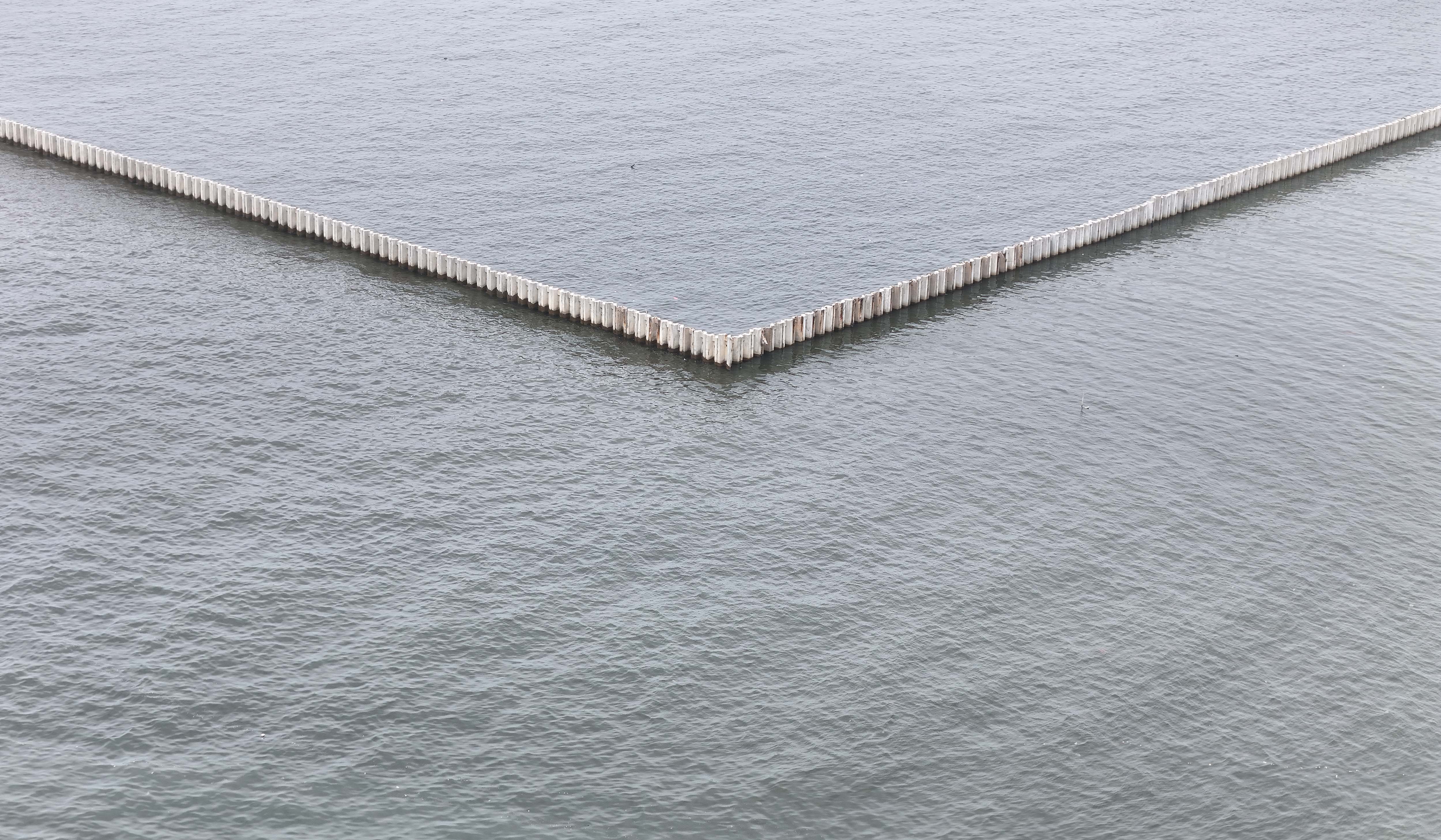 Pagar beton Cilincing. (Agus Priatna/SinPo.id)