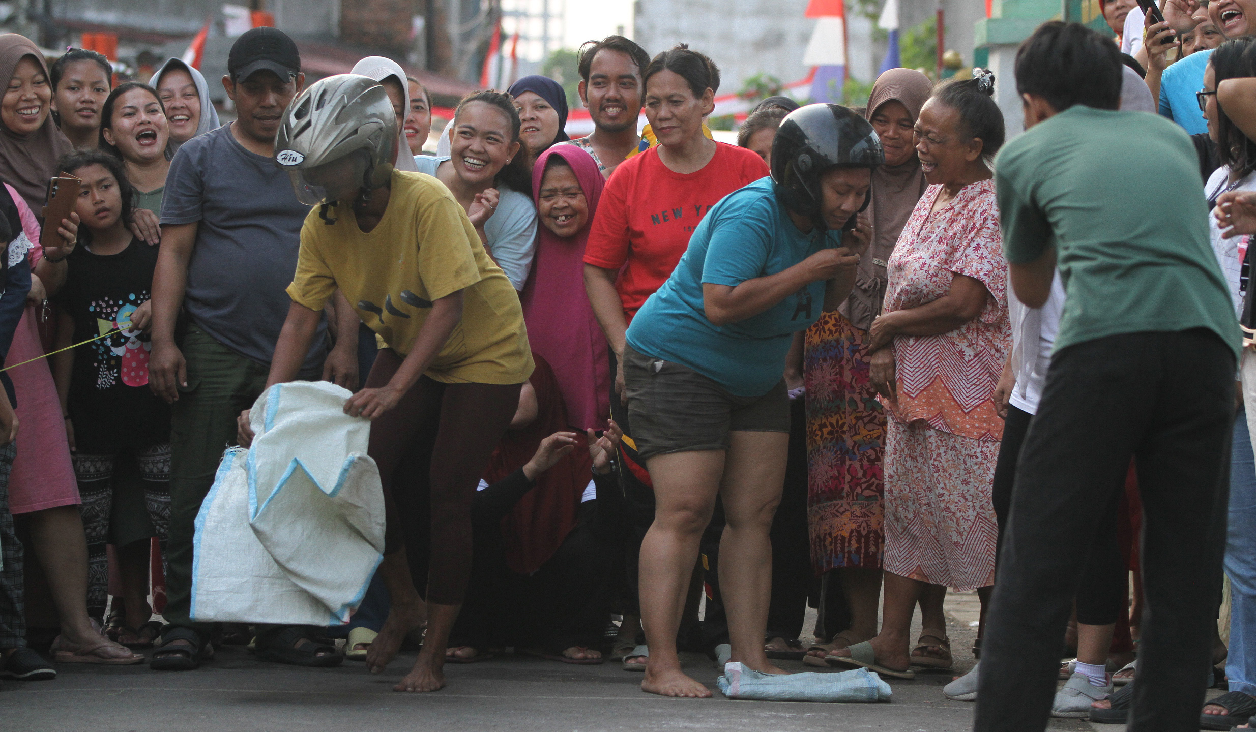 Lomba HUT ke-80 RI di Menteng Jaya. (Agus Priatna/SinPo.id)