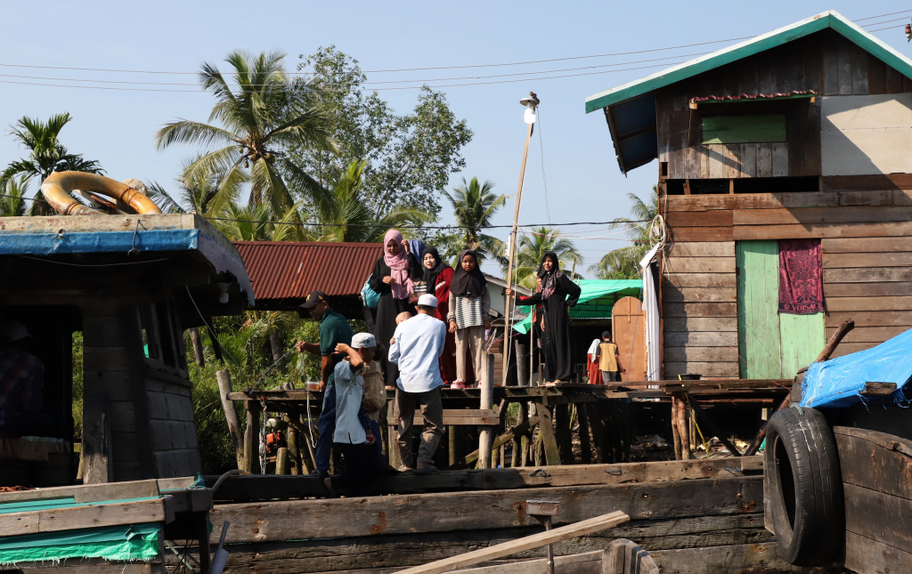 Melihat potret kehidupan warga desa Kuala Selat yang berpenghasilan dari nelayan petani Kelapa dan Mangrove (Ashar/SinPo.id)