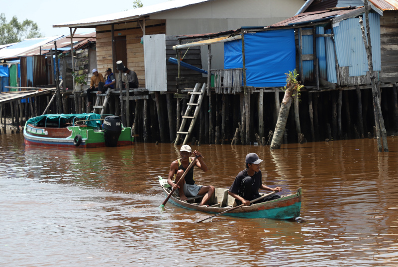 Melihat potret kehidupan warga desa Kuala Selat yang berpenghasilan dari nelayan petani Kelapa dan Mangrove (Ashar/SinPo.id)