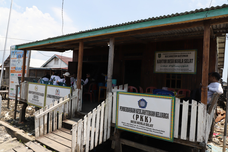 Melihat potret kehidupan warga desa Kuala Selat yang berpenghasilan dari nelayan petani Kelapa dan Mangrove (Ashar/SinPo.id)