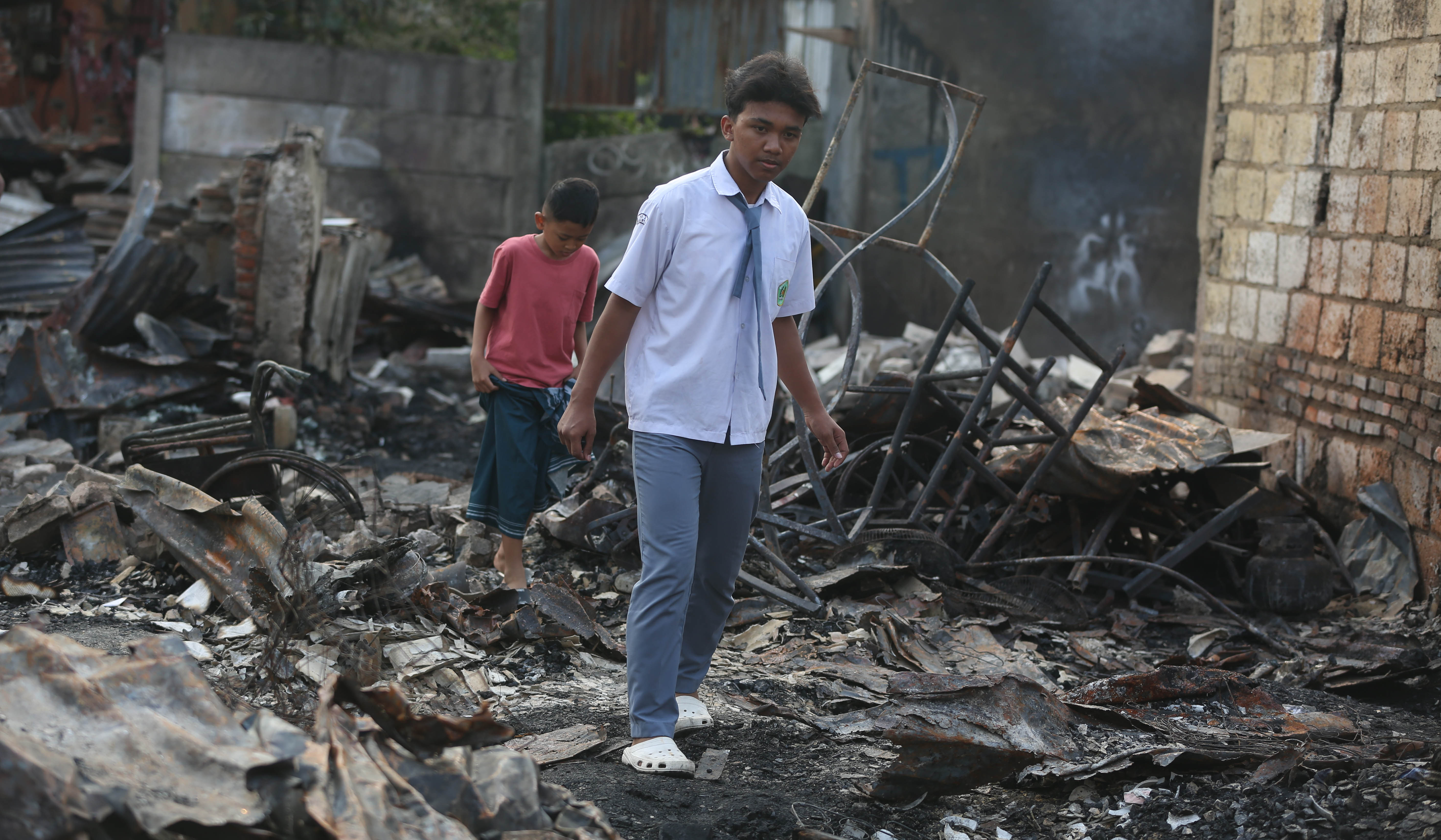 Sisa kebakaran yang hanguskan 250 rumah di Kamayoran. (Agus Priatna/SinPo.id)