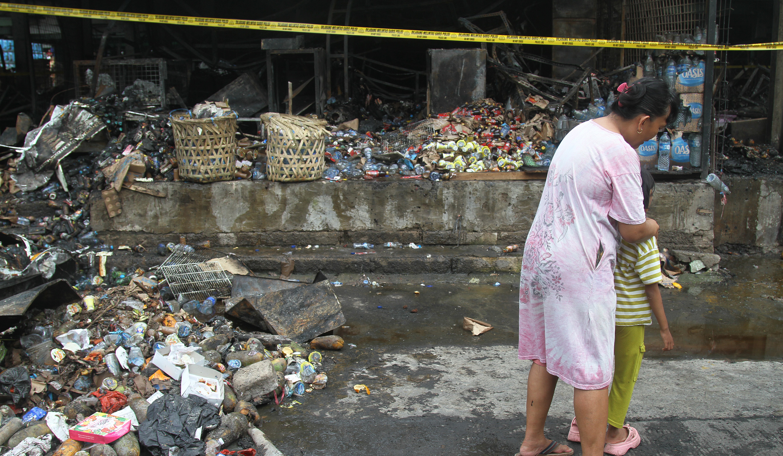 Sisa kebakaran Pasar Induk. (Agus Priatna/SinPo.id)