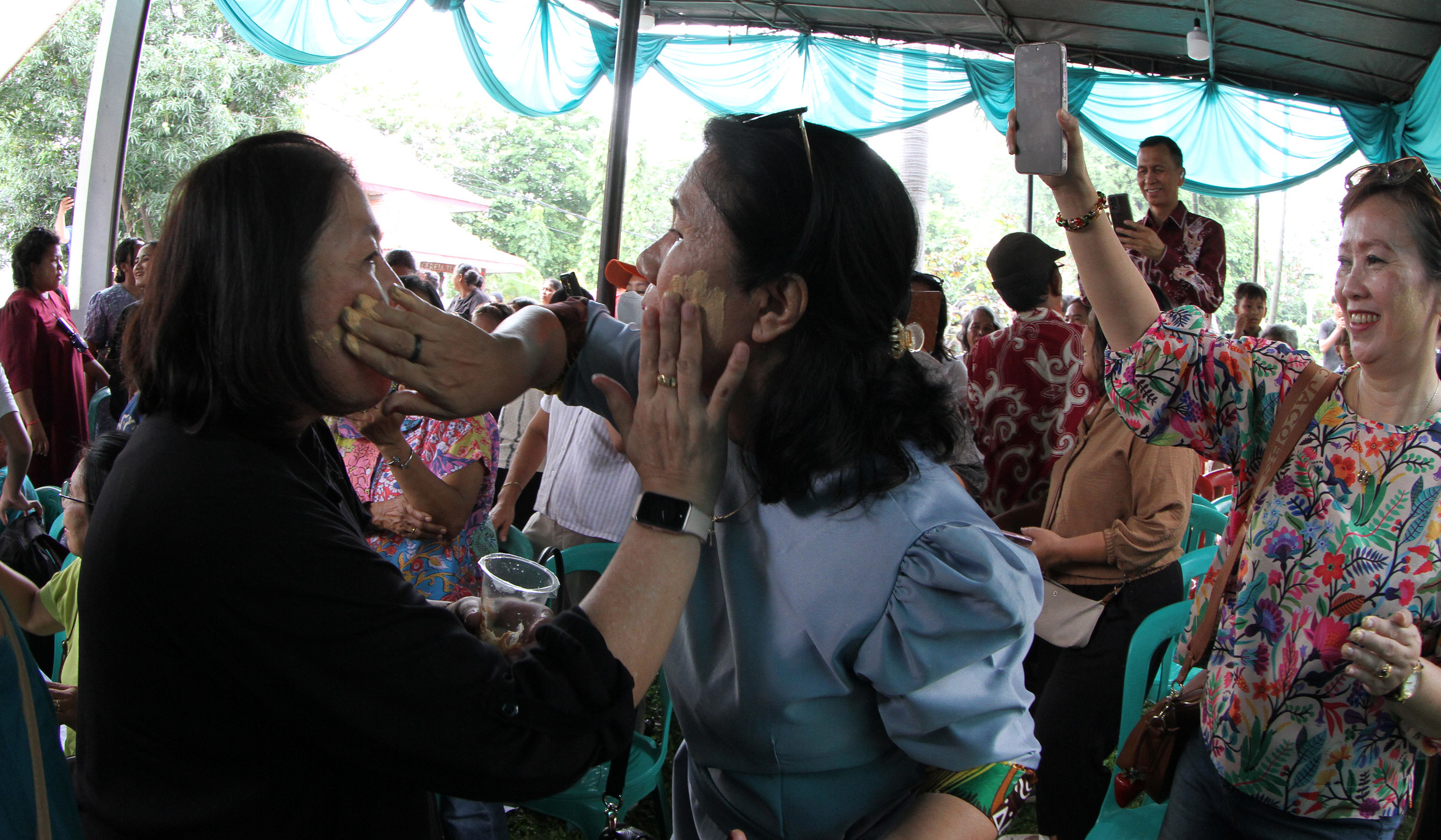 Tradisi Mandi Mandi Kampung Tugu, Jakarta. (Agus Priatna/SinPo.id)