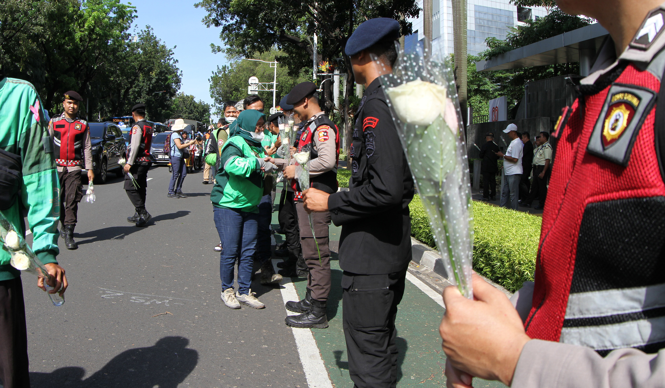 Aksi damai ojol di kawasan Monas, Jakarta. (Agus Priatna/SinPo.id)