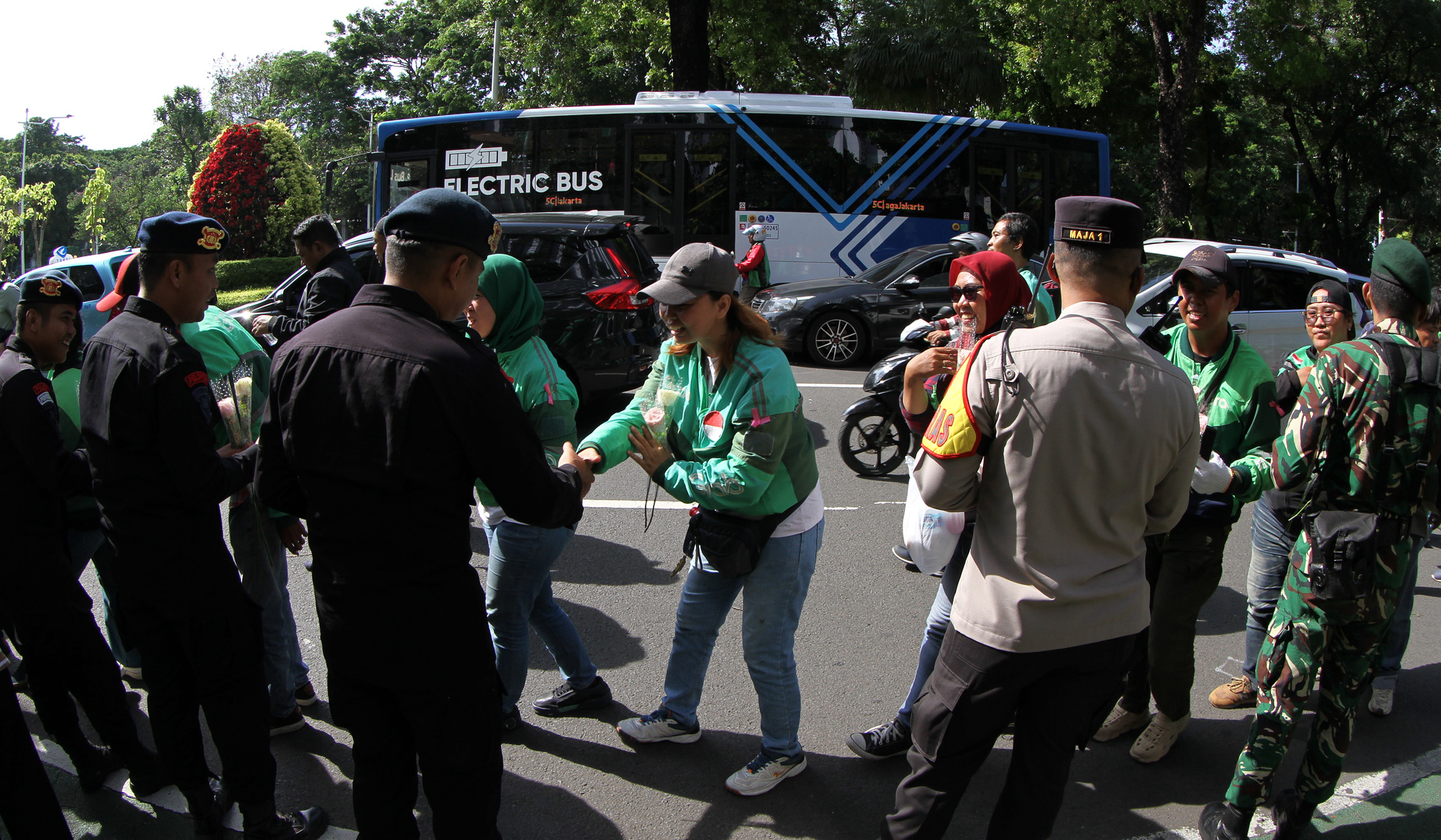 Aksi damai ojol di kawasan Monas, Jakarta. (Agus Priatna/SinPo.id)