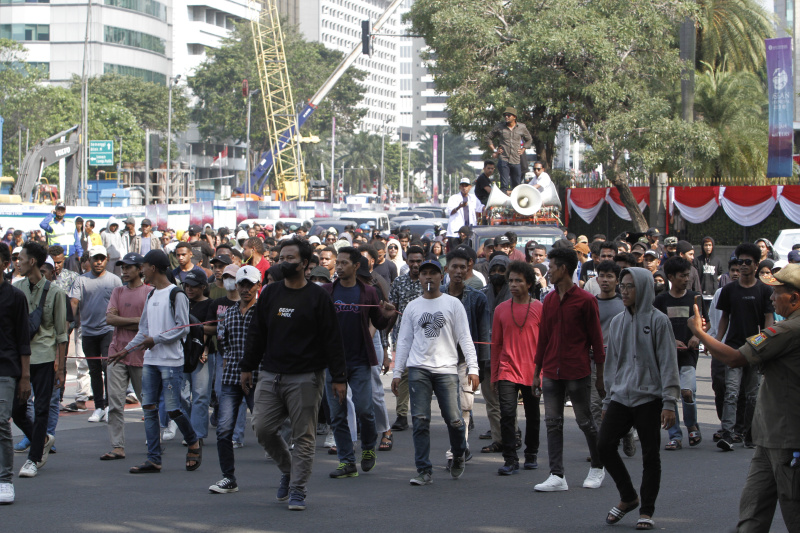 Puluhan para pekerja migran Indonesia  gelar aksi demo menuntut perlindungan dari Pemerintah (Ashar/SinPo.id)