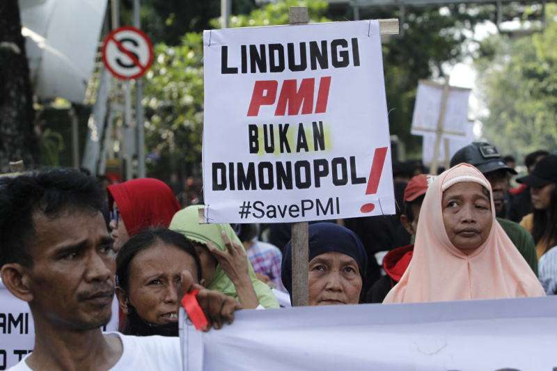 Puluhan para pekerja migran Indonesia  gelar aksi demo menuntut perlindungan dari Pemerintah (Ashar/SinPo.id)